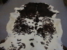 009 Brown and White Cowhide Rug �355