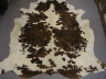 010 Brown and White Cowhide Rug �355